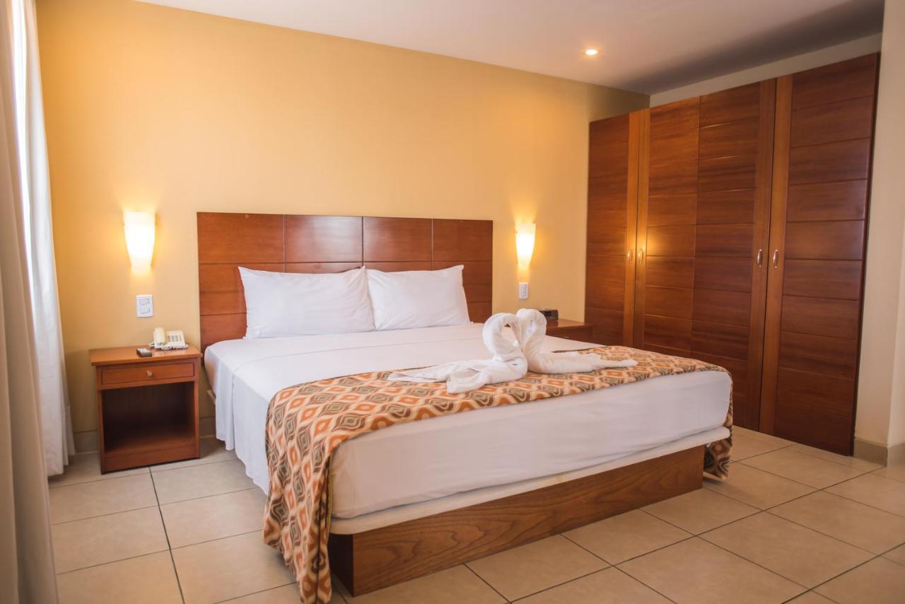 Wyndham Costa Del Sol Pucallpa Exterior foto A bedroom at the hotel
